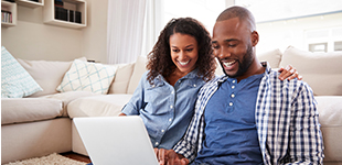 couple looking at computer